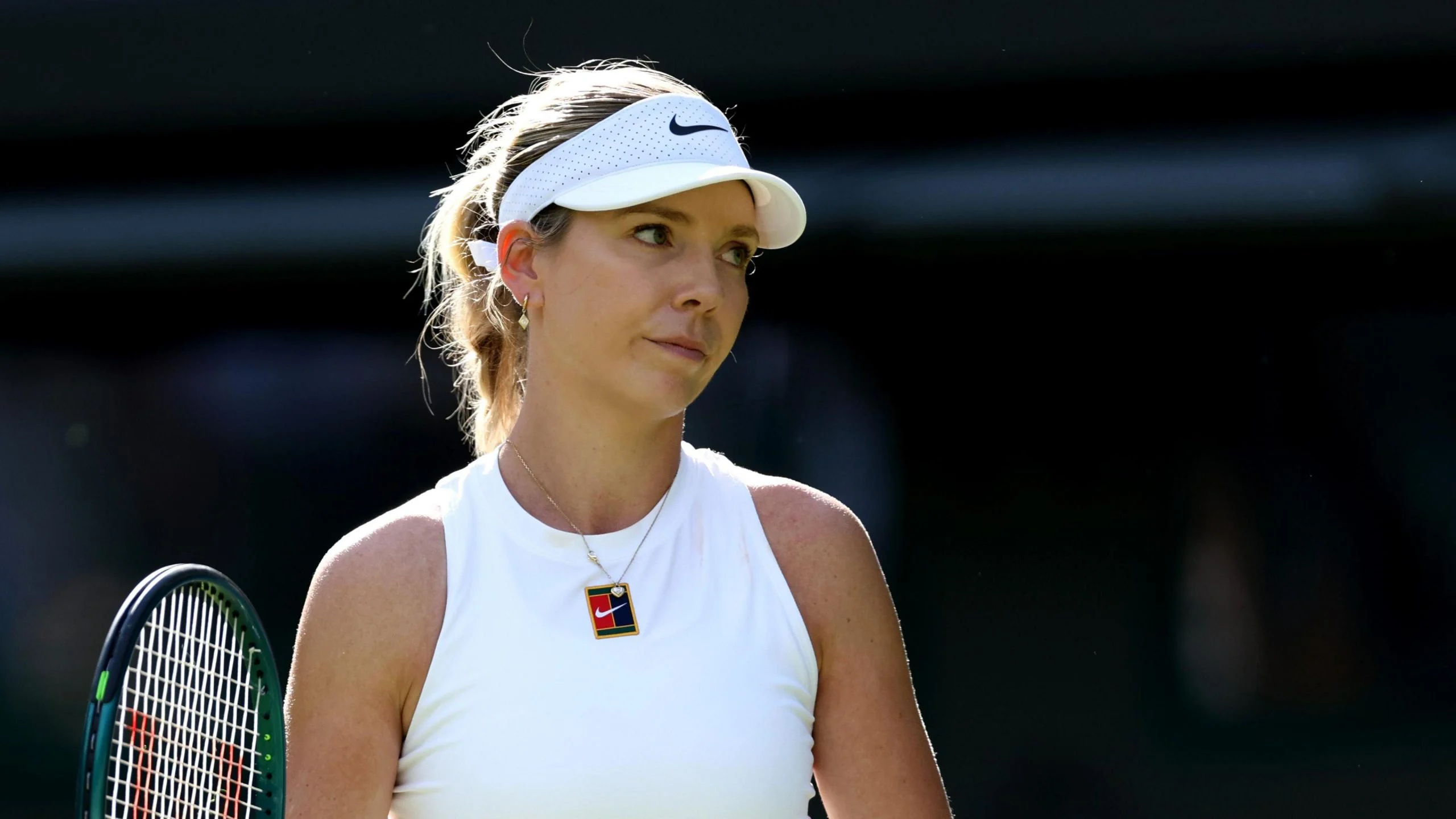 Katie Boulter looks dejected during her Wimbledon defeat by Solana Sierra