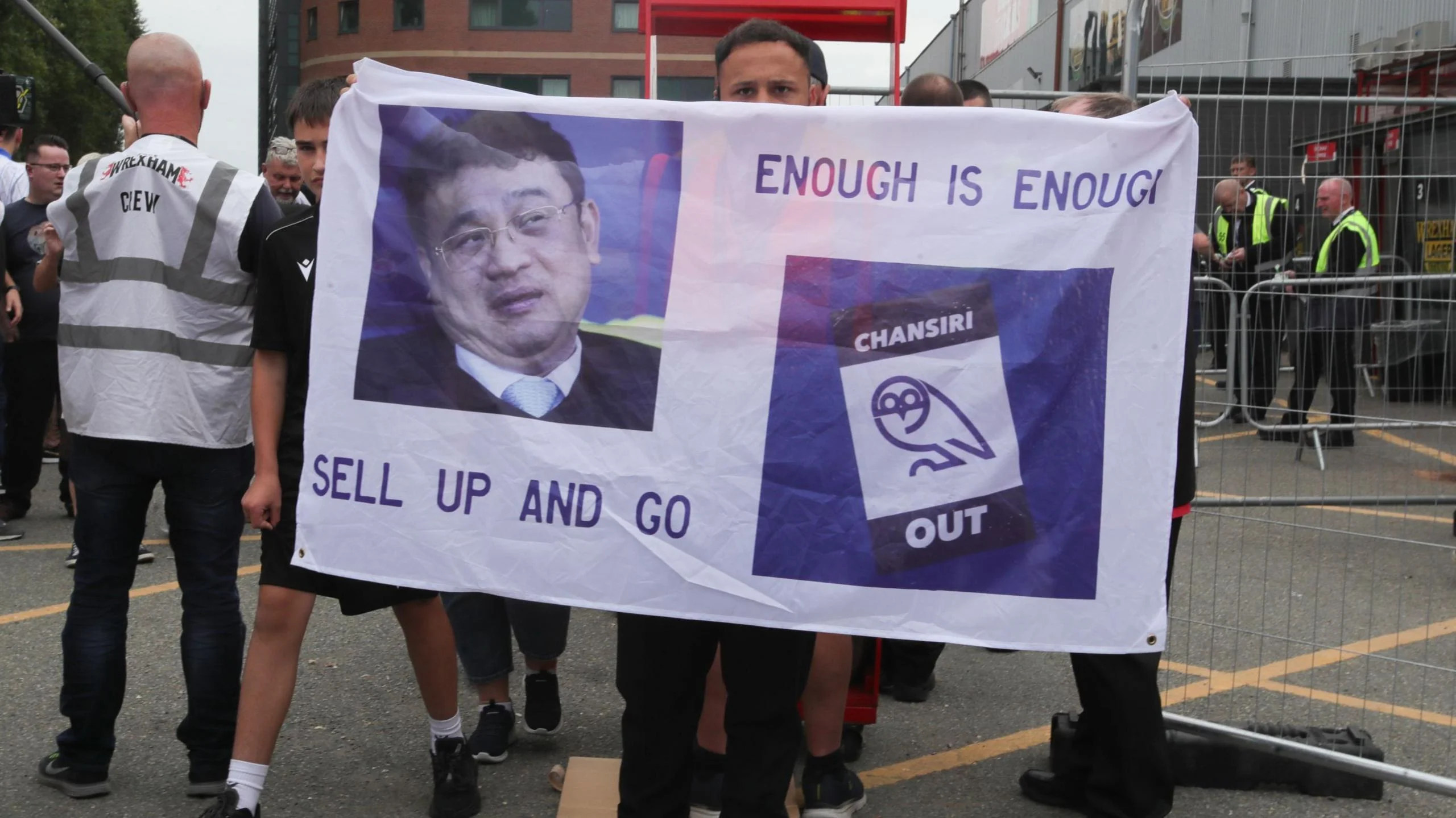 Sheffield Wednesday fans hold up a banner