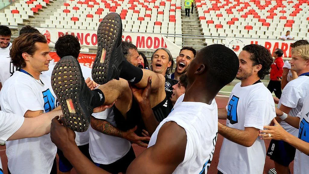 Filippo Inzaghi and Pisa's players celebrate promotion to Serie A