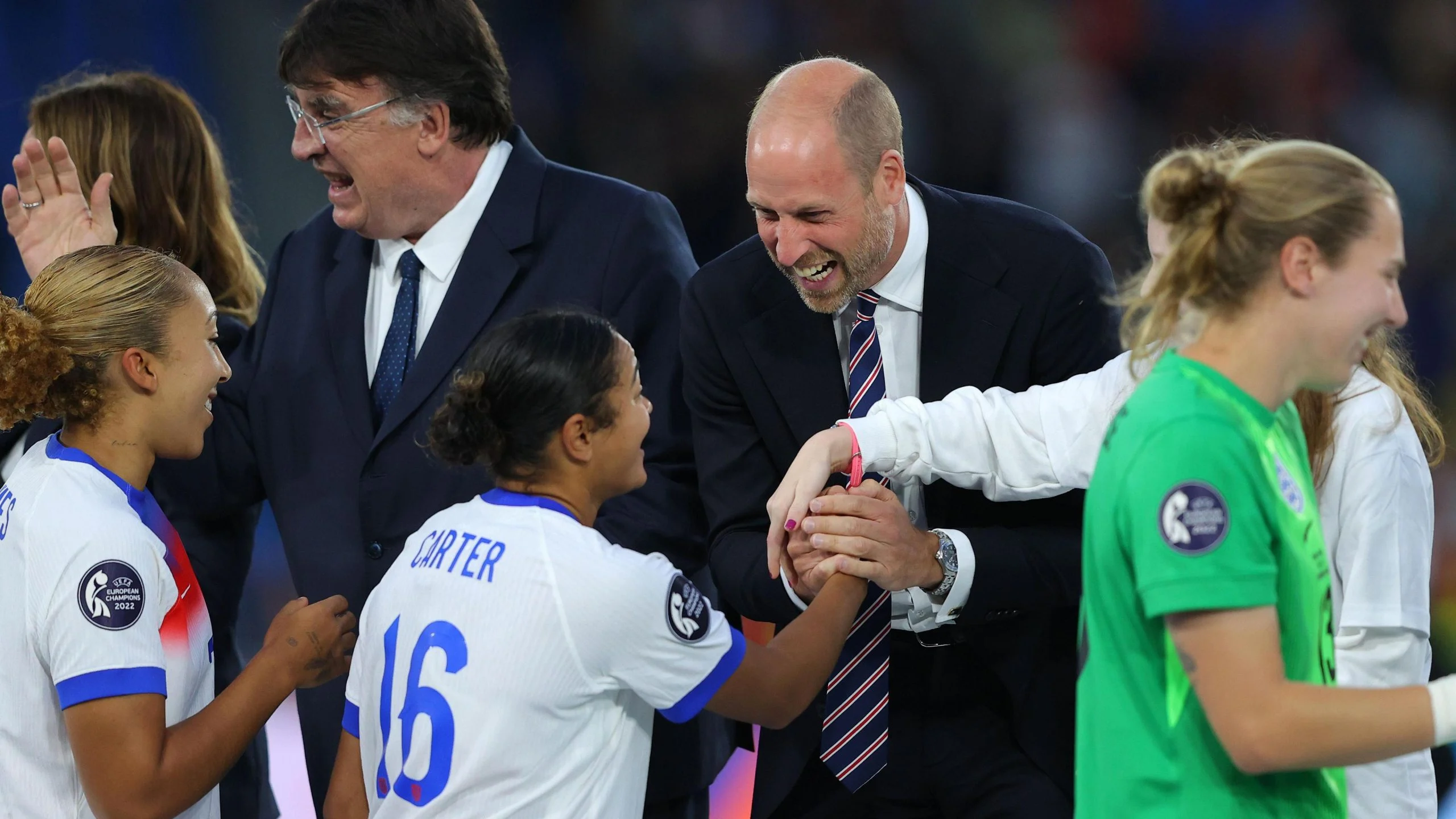 Jess Carter celebrates with the Prince of Wales