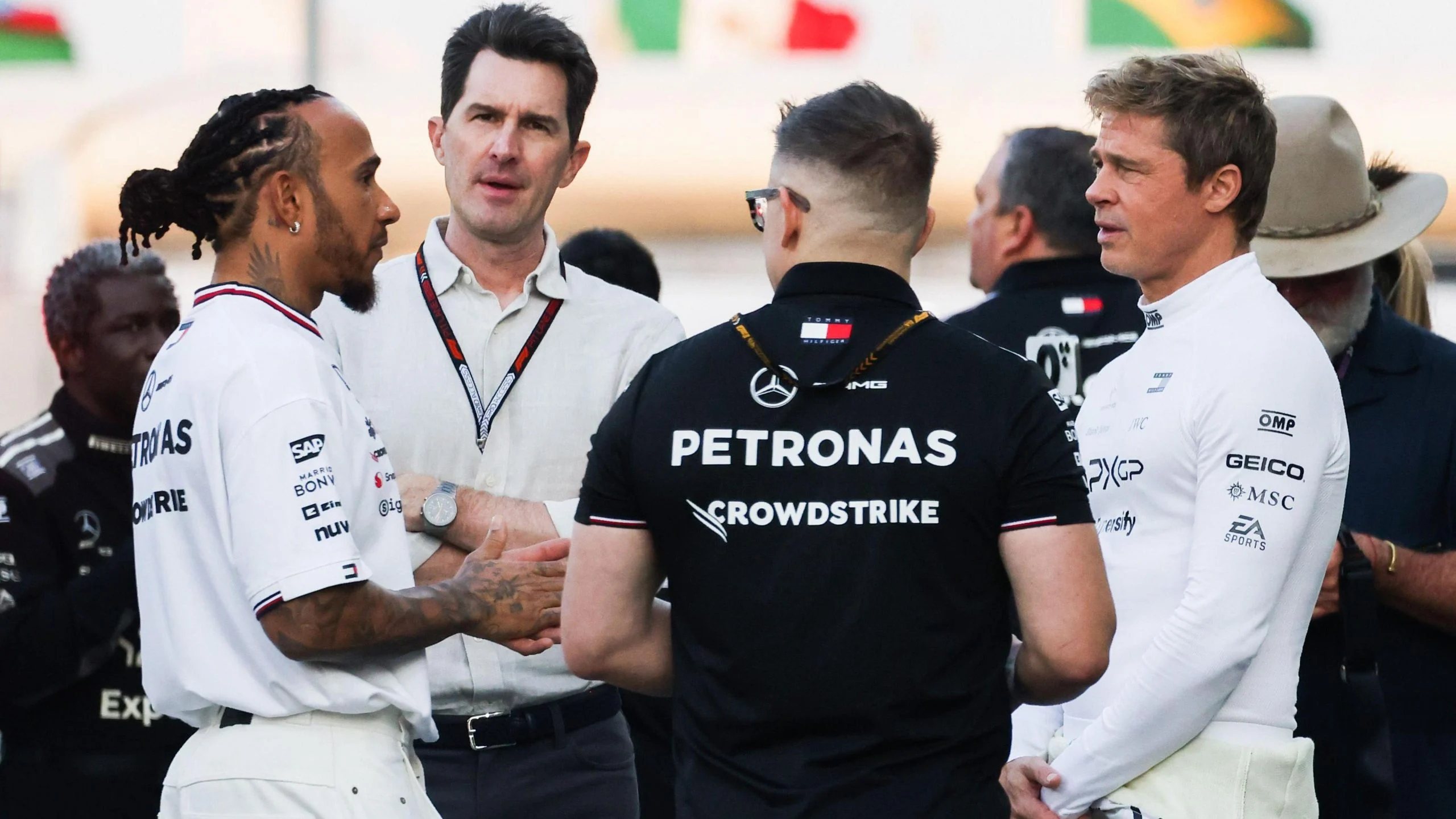 Lewis Hamilton chats to Brad Pitt at the 2024 Abu Dhabi Grand Prix