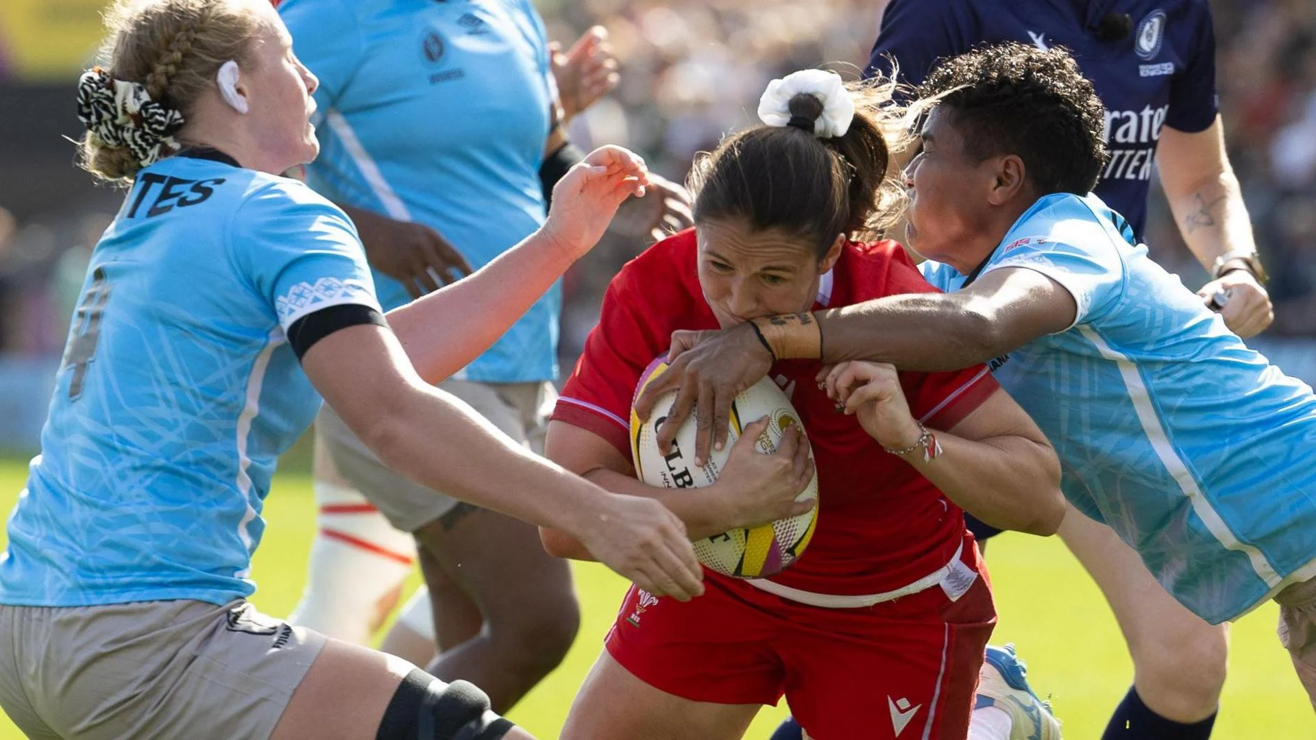 Kayleigh Powell is tackled by Fiji