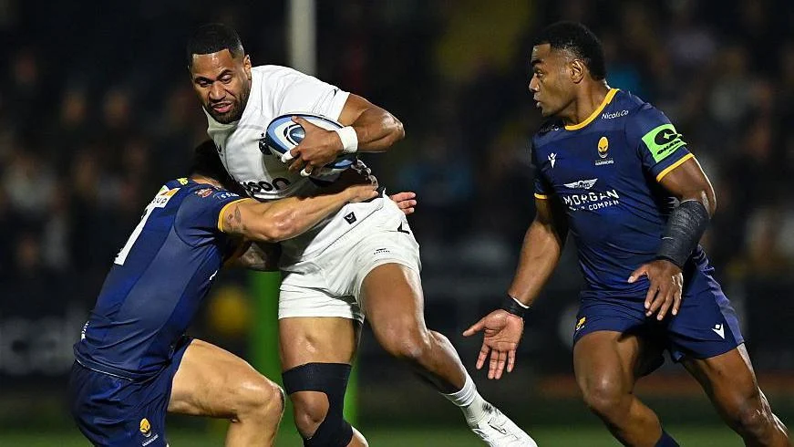 Worcester Warriors players make a tackle during their pre-season friendly against Bath