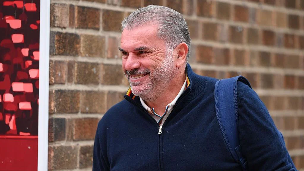 Ange Postecoglou smiles
