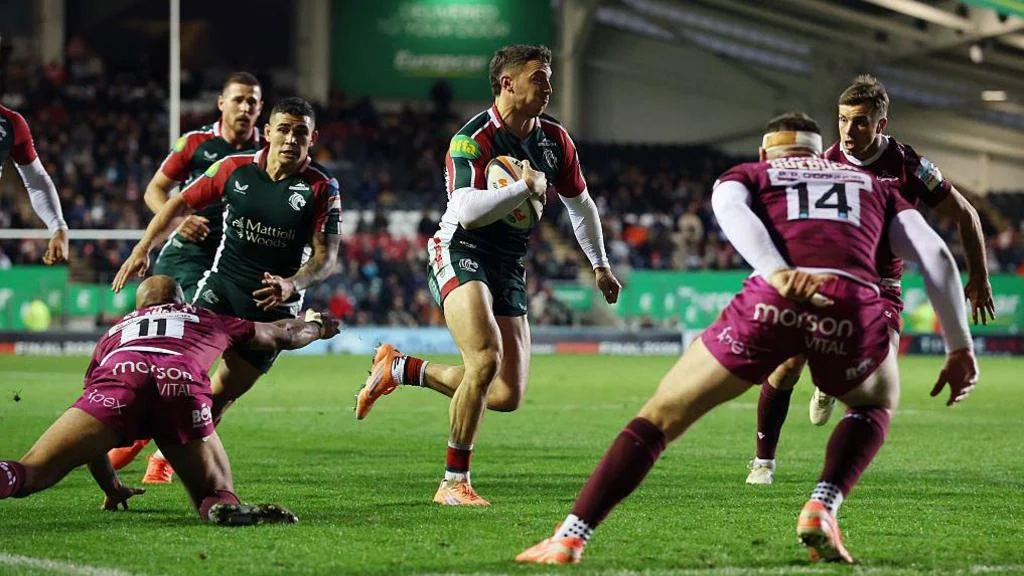 Adam Radwan races away for a try
