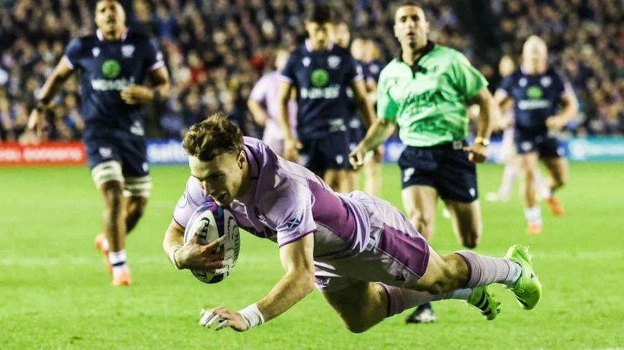 Jamie Dobie scores Scotland's fourth try against USA