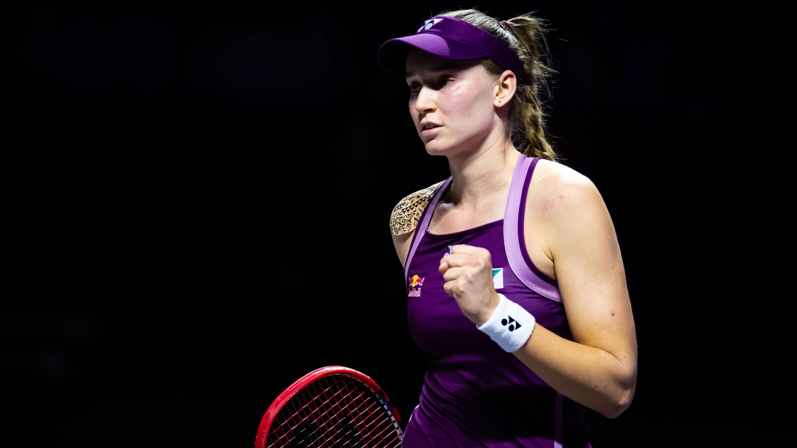Elena Rybakina clenches her fist in celebration